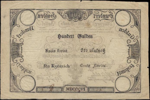 Deutsche 100-Pfennig-Banknote mit einem Mann auf schwarzem Hintergrund.