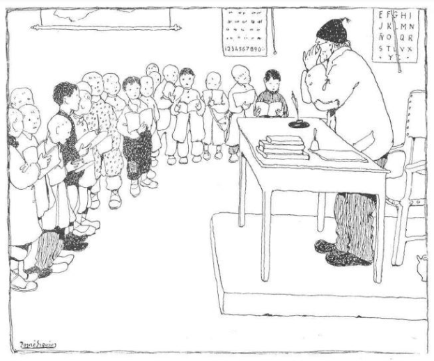 Ein Mann sitzt an einem Schreibtisch mit Büchern und Gegenständen vor einer Gruppe von Kindern, mit Papieren an der Wand dahinter, was darauf hinweist, dass er wahrscheinlich ein Lehrer ist.