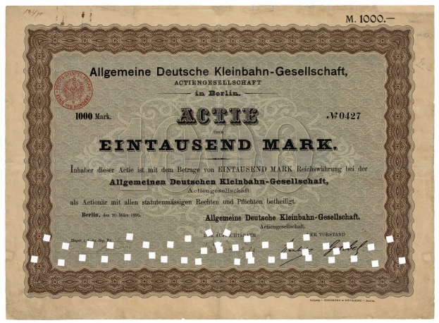 Ein altes deutsches Wertpapier, ausgestellt von der deutschen Regierung, mit Text und einem Stempel.