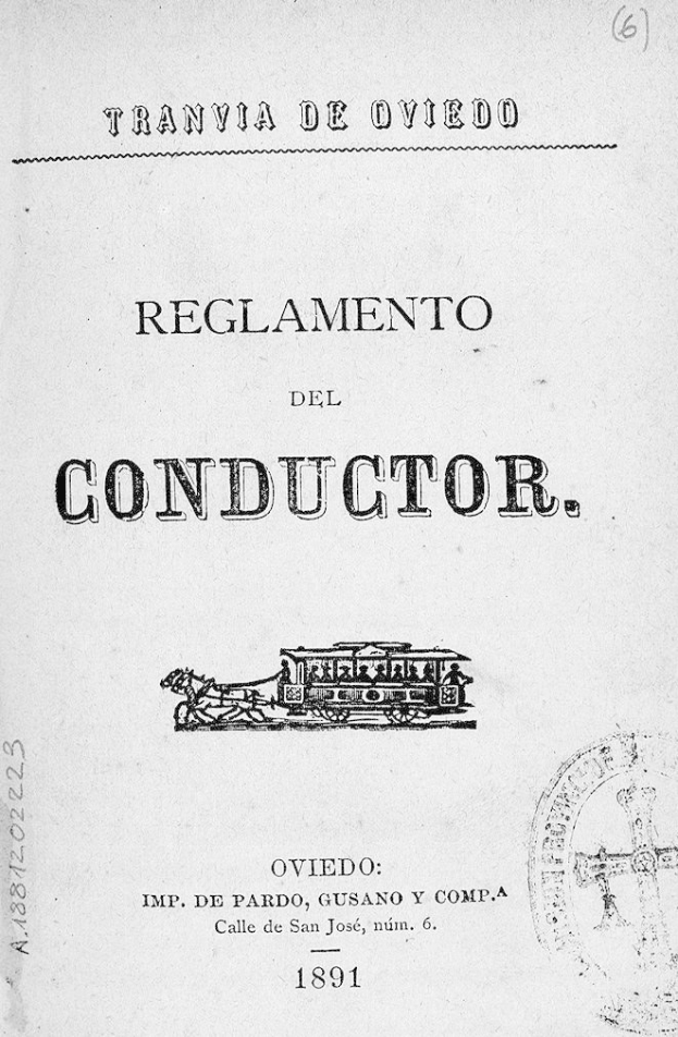 Altes Buch mit dem Titel 'Reglamento de Conductor' mit einer Zugzeichnung auf dem Cover und einem Stempel auf der rechten Seite.