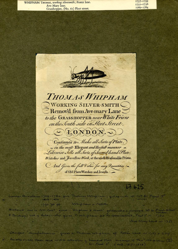 Altes Buch mit einer Grashüpfer-Illustration und Text auf seinen Seiten.