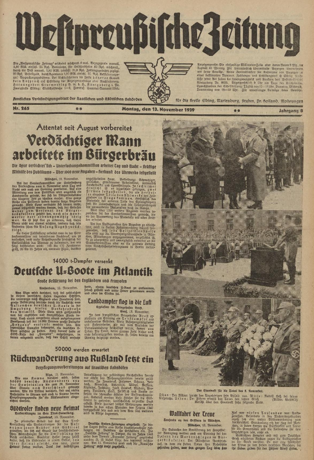 Schwarze und weisse Titelseite einer deutschen Zeitung vom 13. November 1939, betitelt 'Weitpreubliche Zeitung', mit einer Gruppe von Menschen in traditioneller deutscher Kleidung auf dem Bild.