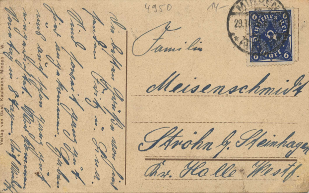 Eine alte Ansichtskarte mit einem blauen Stempel und deutscher Schrift darauf.